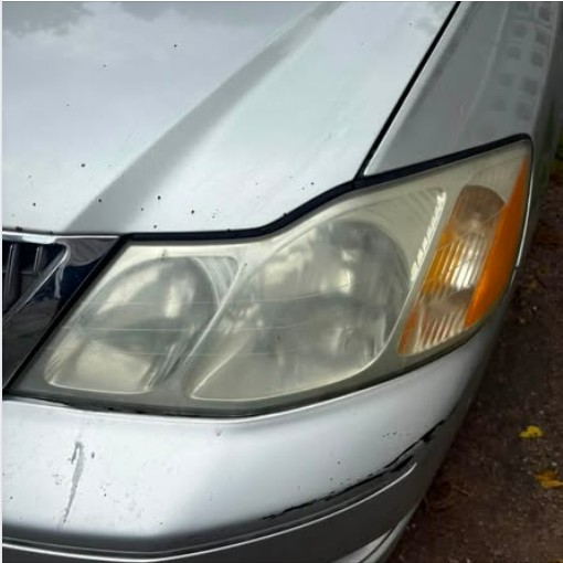 Foggy headlight before restoration on a second vehicle